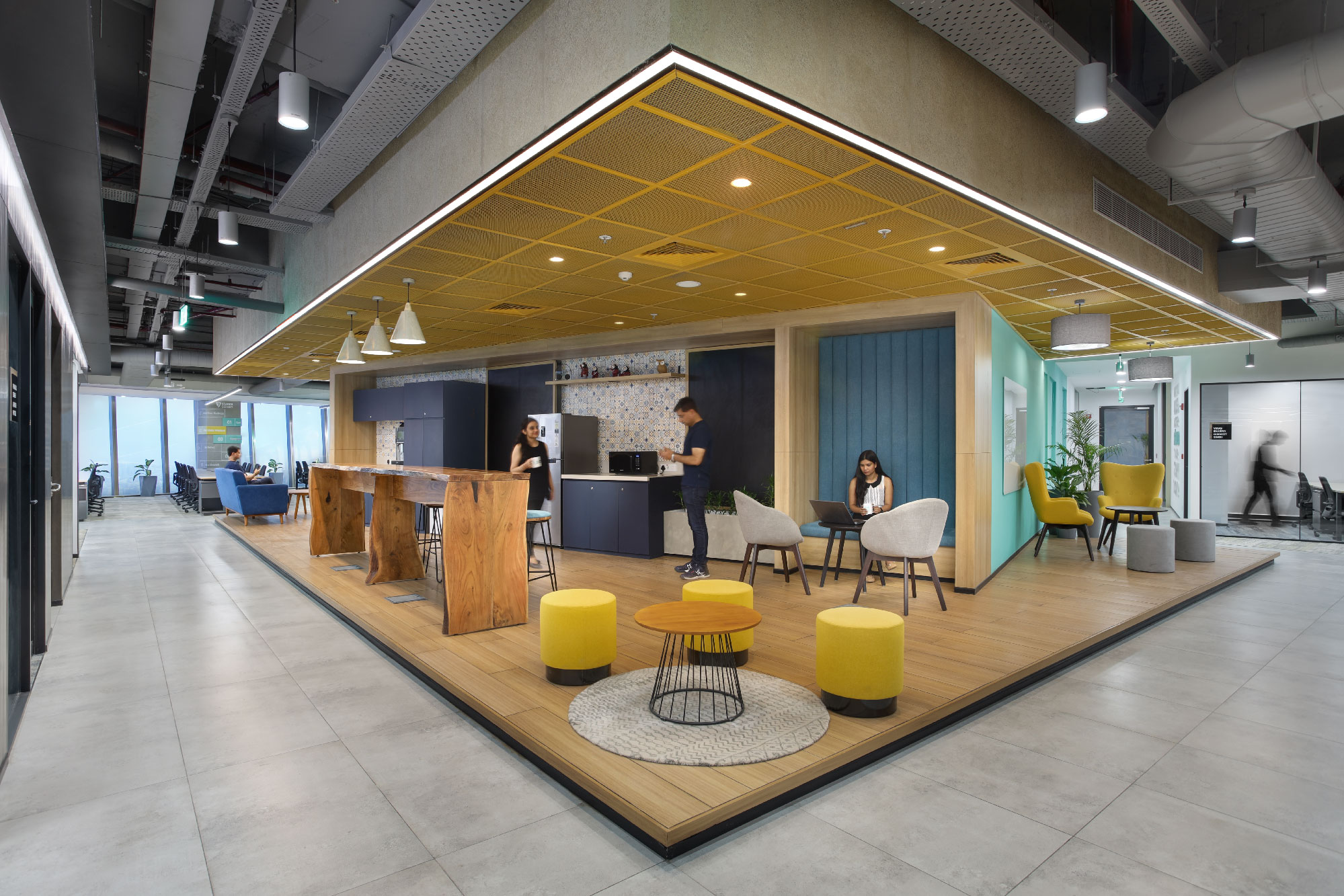 Stanza Living startup office interior with open-plan workspace